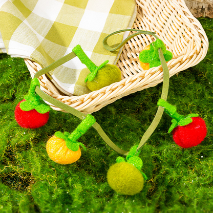 Ficelle interactive en forme de fruit pour chat