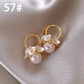 Boucle d'oreille perle classique française, élégante et simple